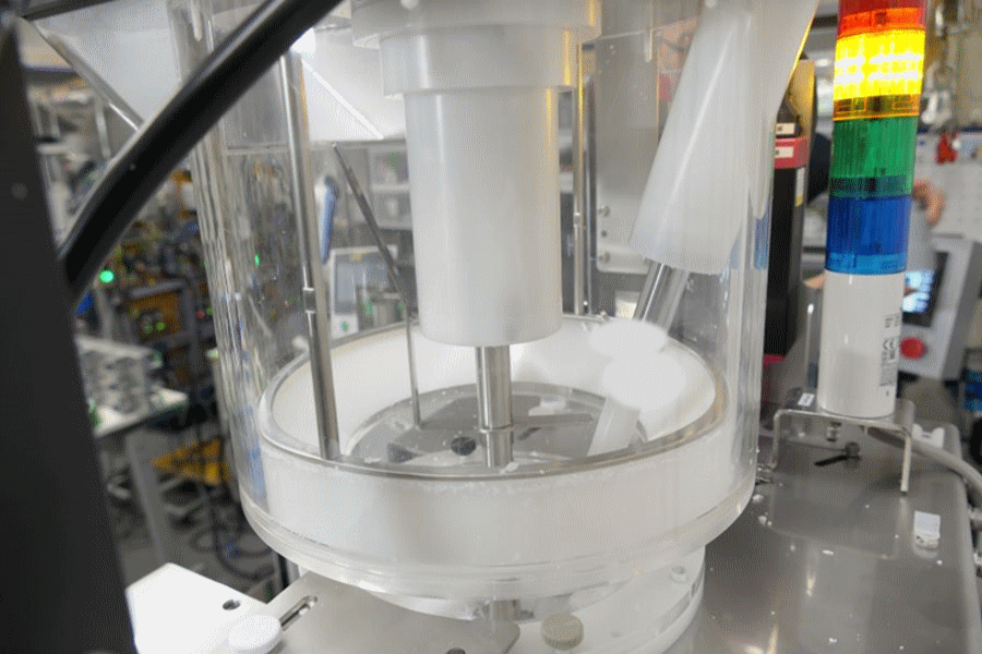 量産製品製作向け連続計量型装置パウローターンテーブル仕様ー